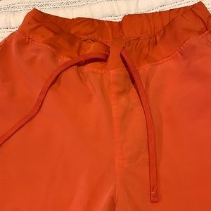 Mandala jogger type scrub pants.